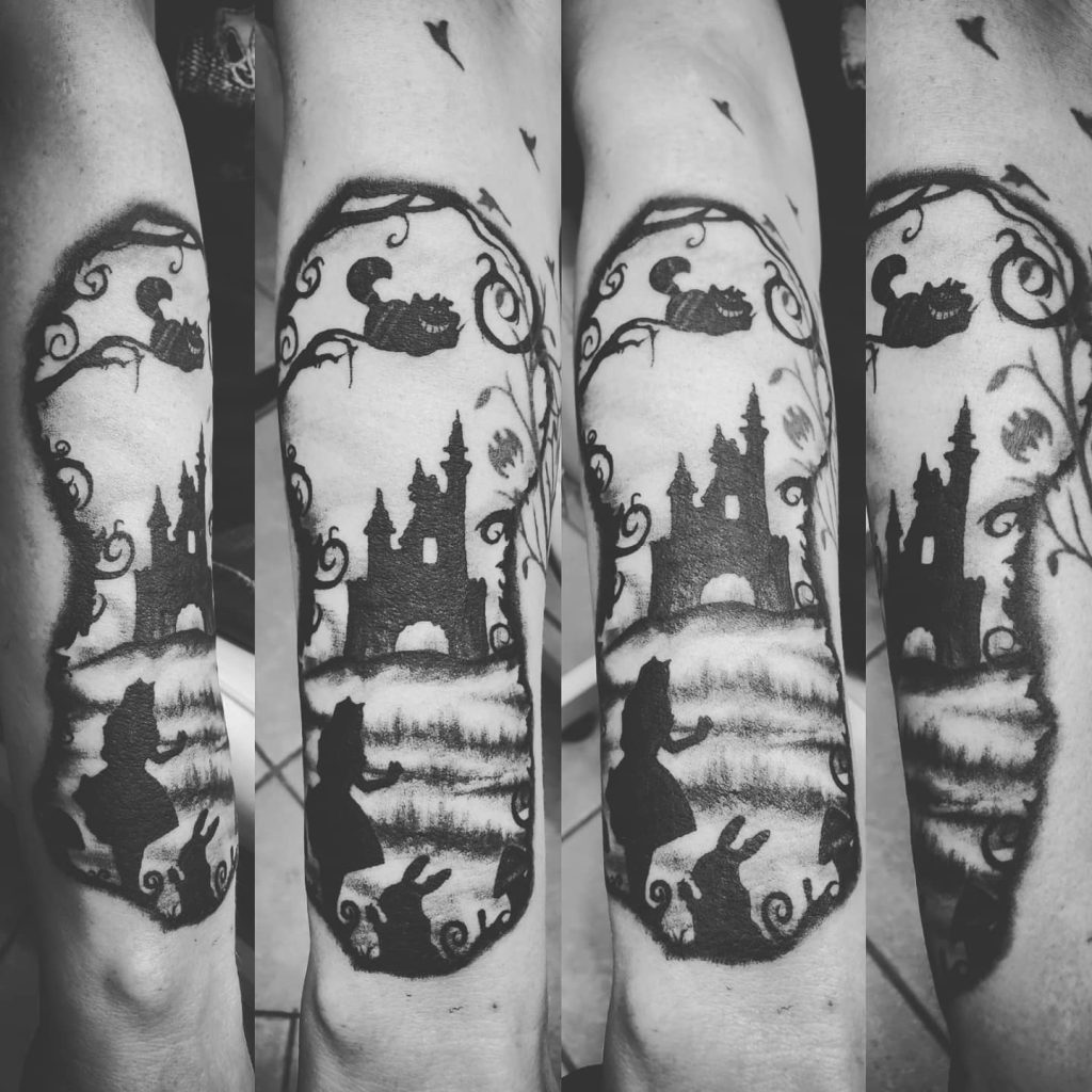 A.I.W. (Alice in wonderland) tattoo