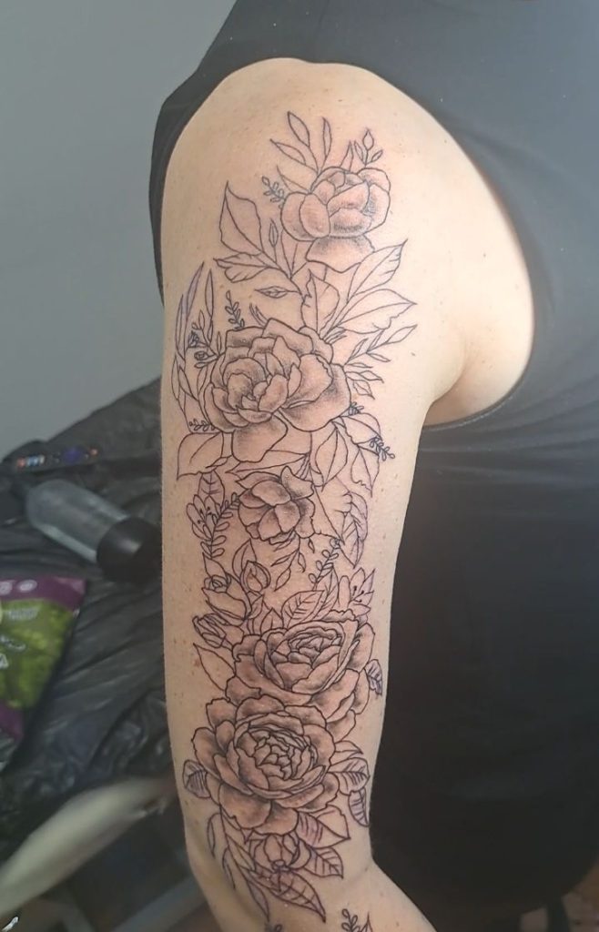 Fineline floral tattoo