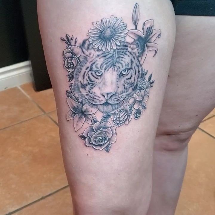 Tiger face & flowers tattoo