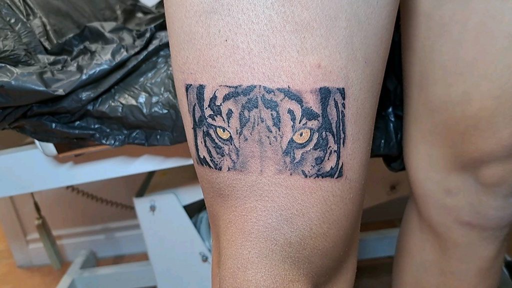 Tiger face tattoo